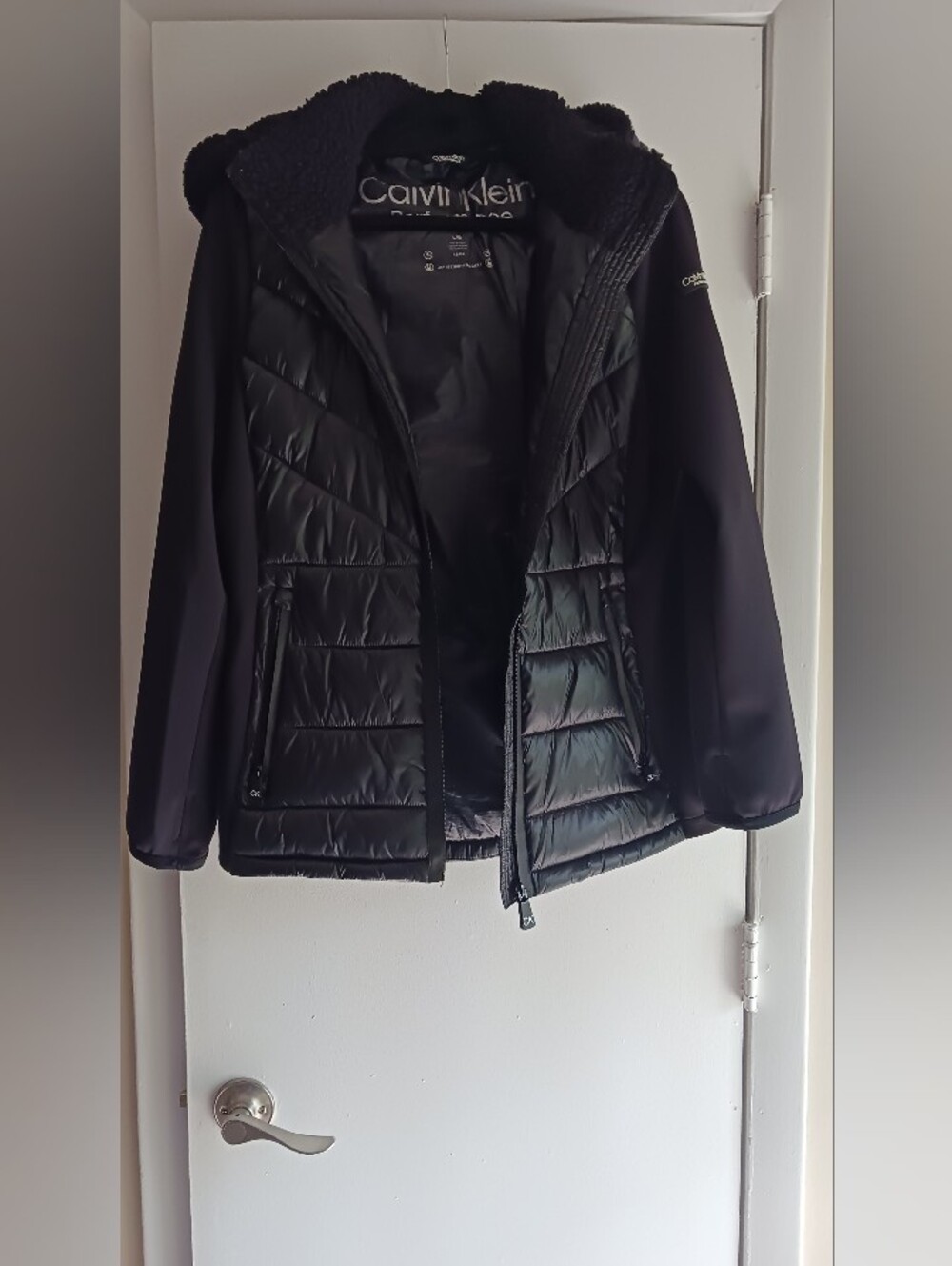 Quilted Hooded Jacket with Knit Sleeves
